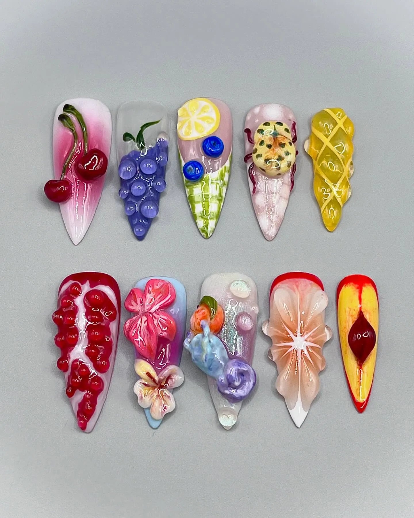 Handmade 3D press-on nails with cherry, lemon, pomegranate, and summer fruit designs