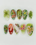 Handmade 3D press-on nails with green tropical orchid and lily floral designs