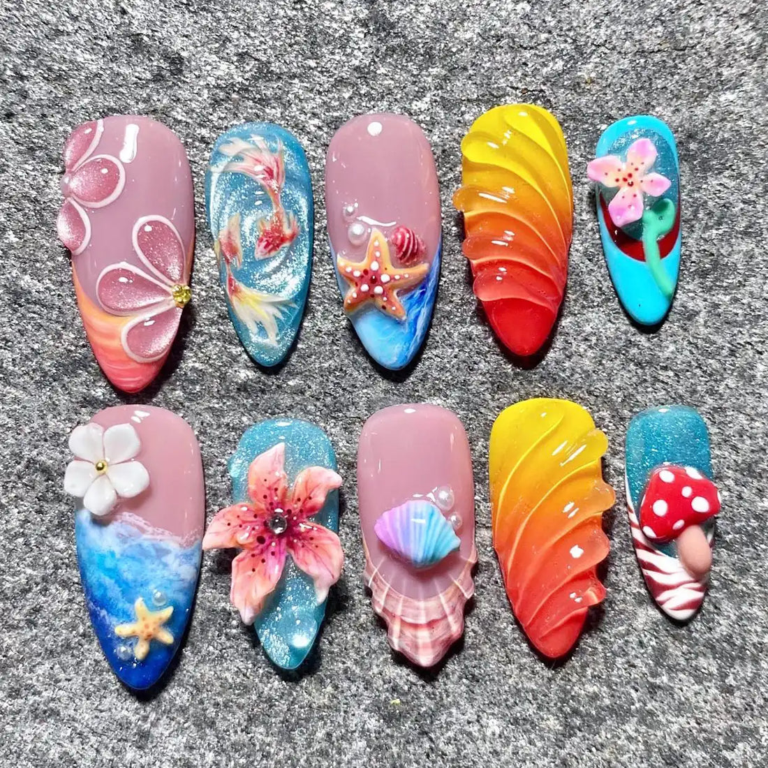 Handmade press-on nails with 3D beach, ocean, flower, and mermaid designs, vibrant colors