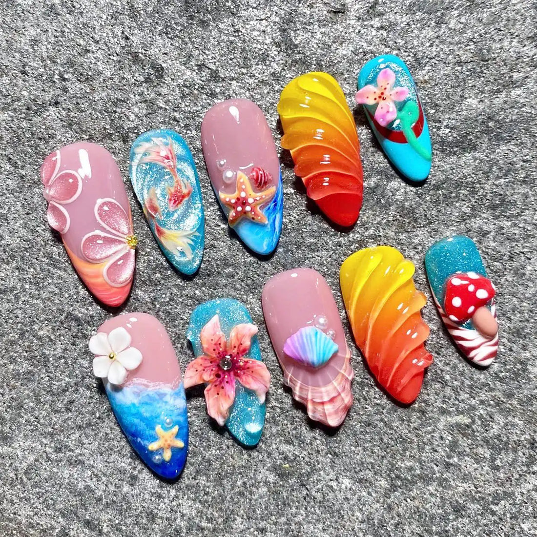 Handmade press-on nails with 3D beach, ocean, flower, and mermaid designs, vibrant colors