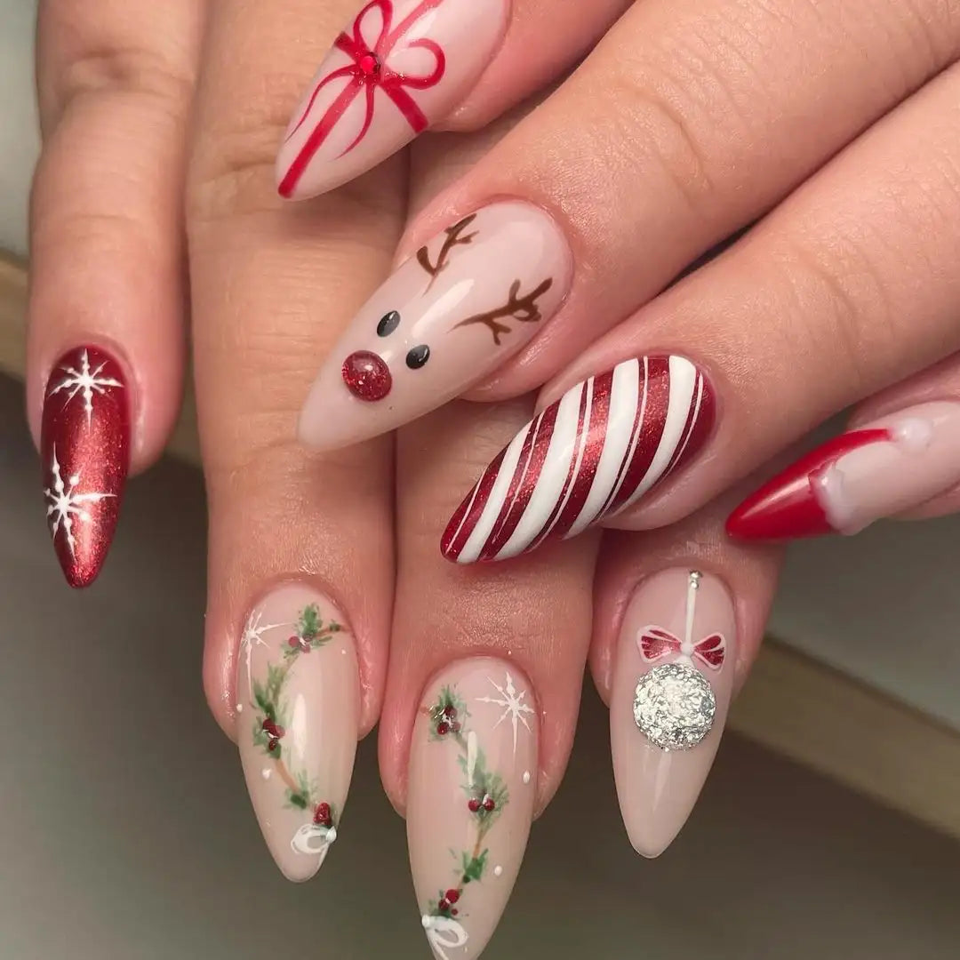 Handmade Christmas press-on nails with reindeer, wreath, ornament, snowflake, and candy cane designs