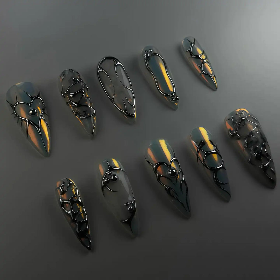 Handmade chrome silver 3D heart abstract metallic press-on nails with futuristic designs