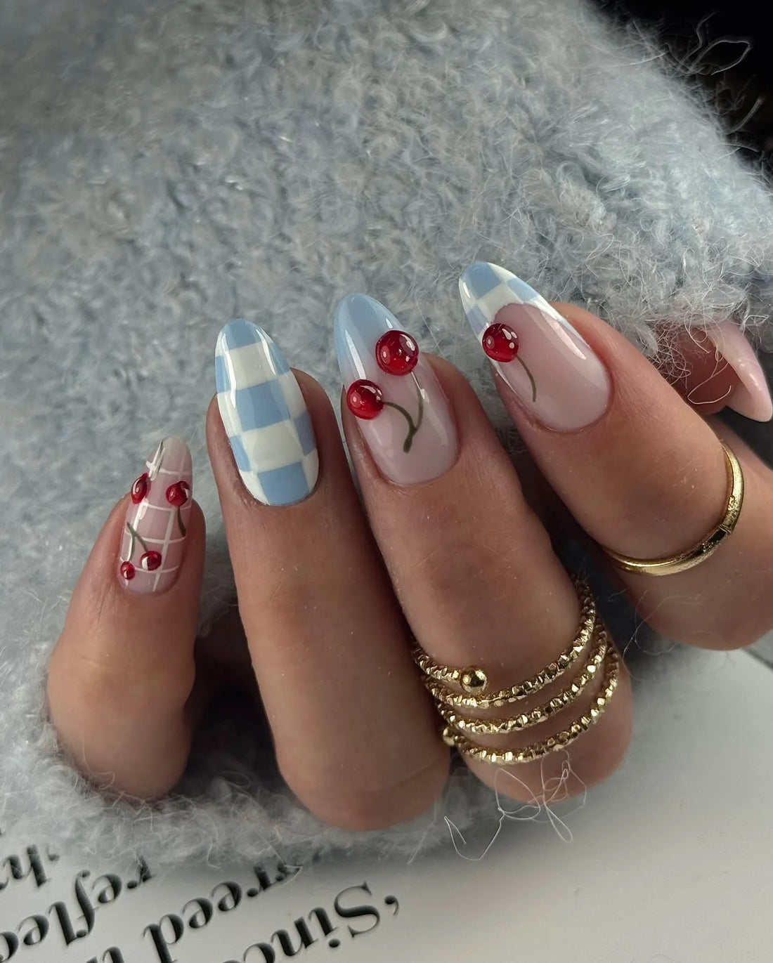 Handmade press-on nails with red cherry and blue gingham plaid picnic vintage summer design.