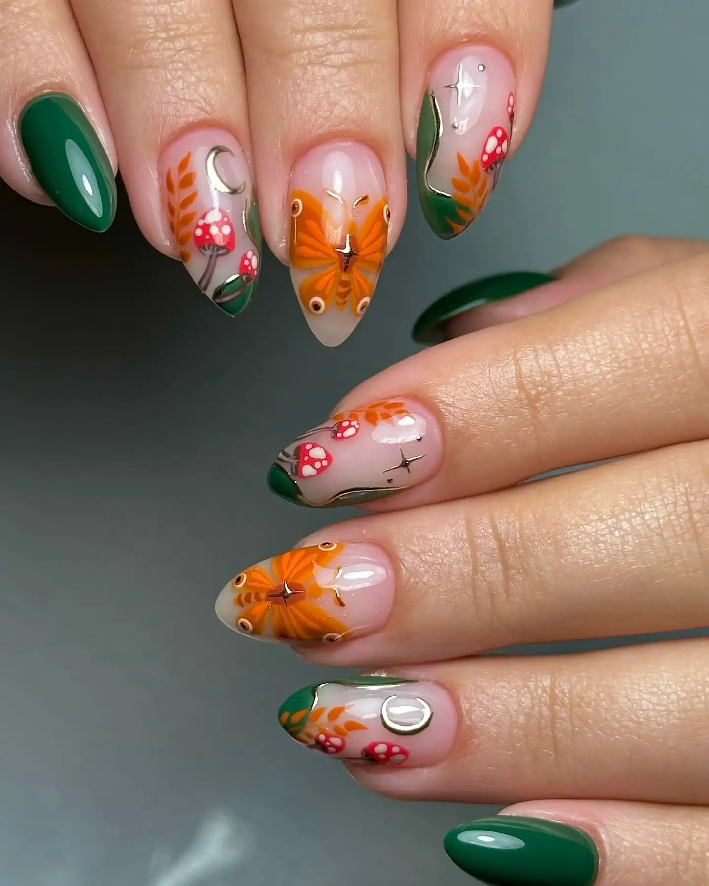 Handmade press-on nails with autumn butterfly, mushroom, moon, and fairycore designs