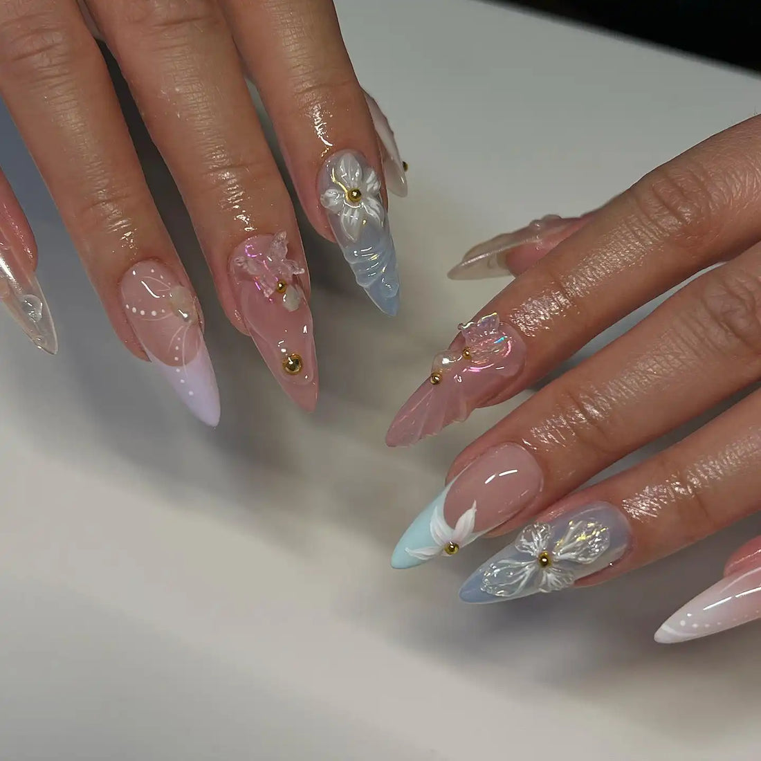 Handmade 3D floral butterfly spring press-on nails with pastel colors and gold accents