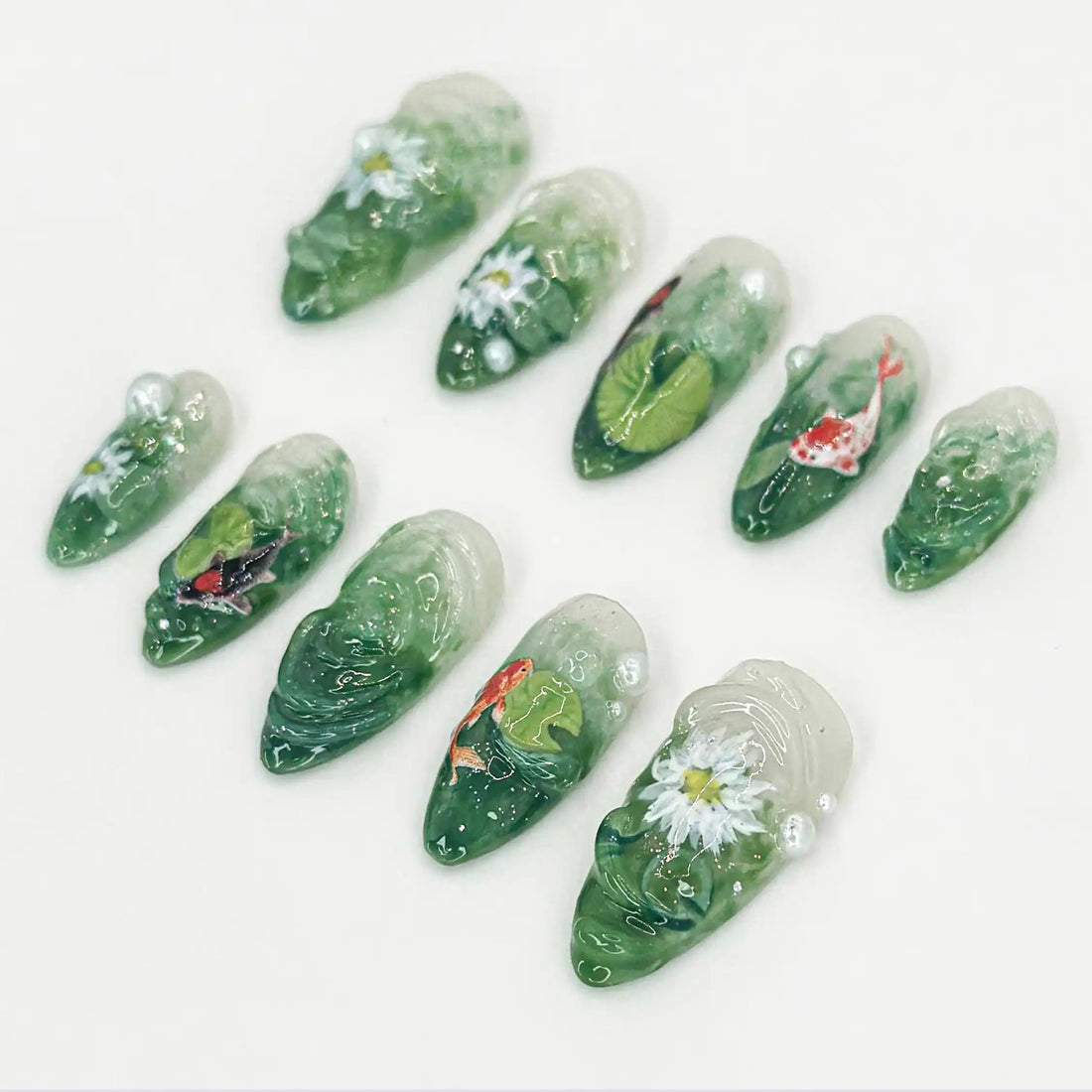 Handmade 3D green press-on nails with koi fish, lotus flowers, and pearl accents