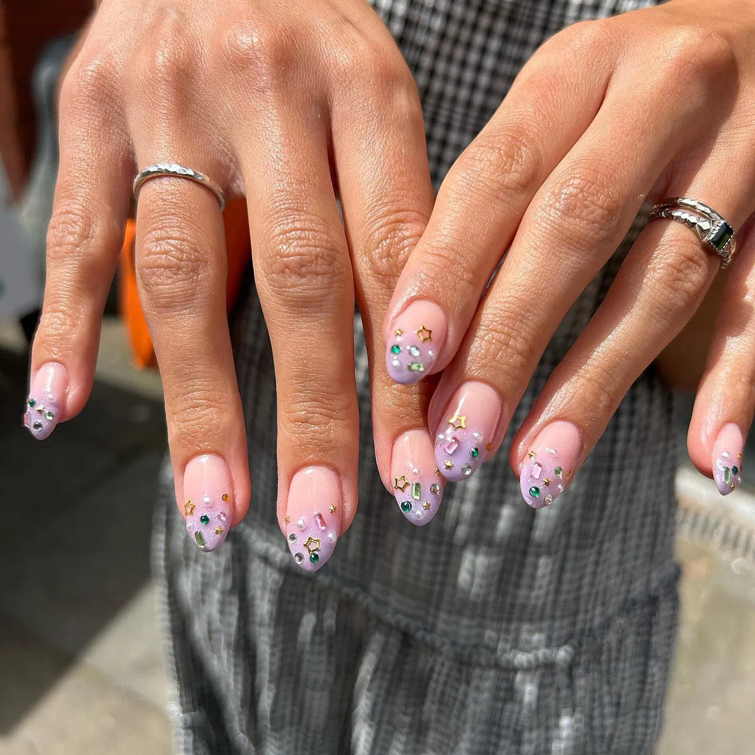 Handmade lavender ombre press-on nails with gemstone and gold star accents