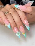 Handmade mint seafoam French tip press-on nails with 3D floral, starfish, and pearl accents