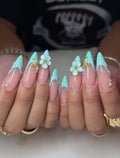 Handmade mint seafoam press-on nails with 3D floral, starfish, and pearl accents.