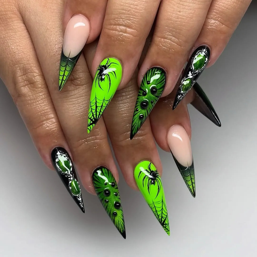 Handmade neon green and black press-on nails with 3D spider web and water drop designs.