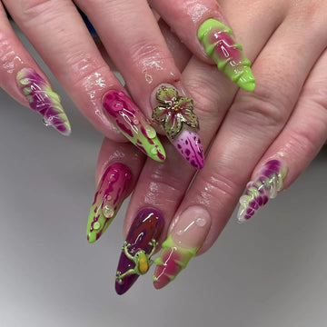Handmade neon green, pink, and purple press-on nails with abstract drip and frog designs.