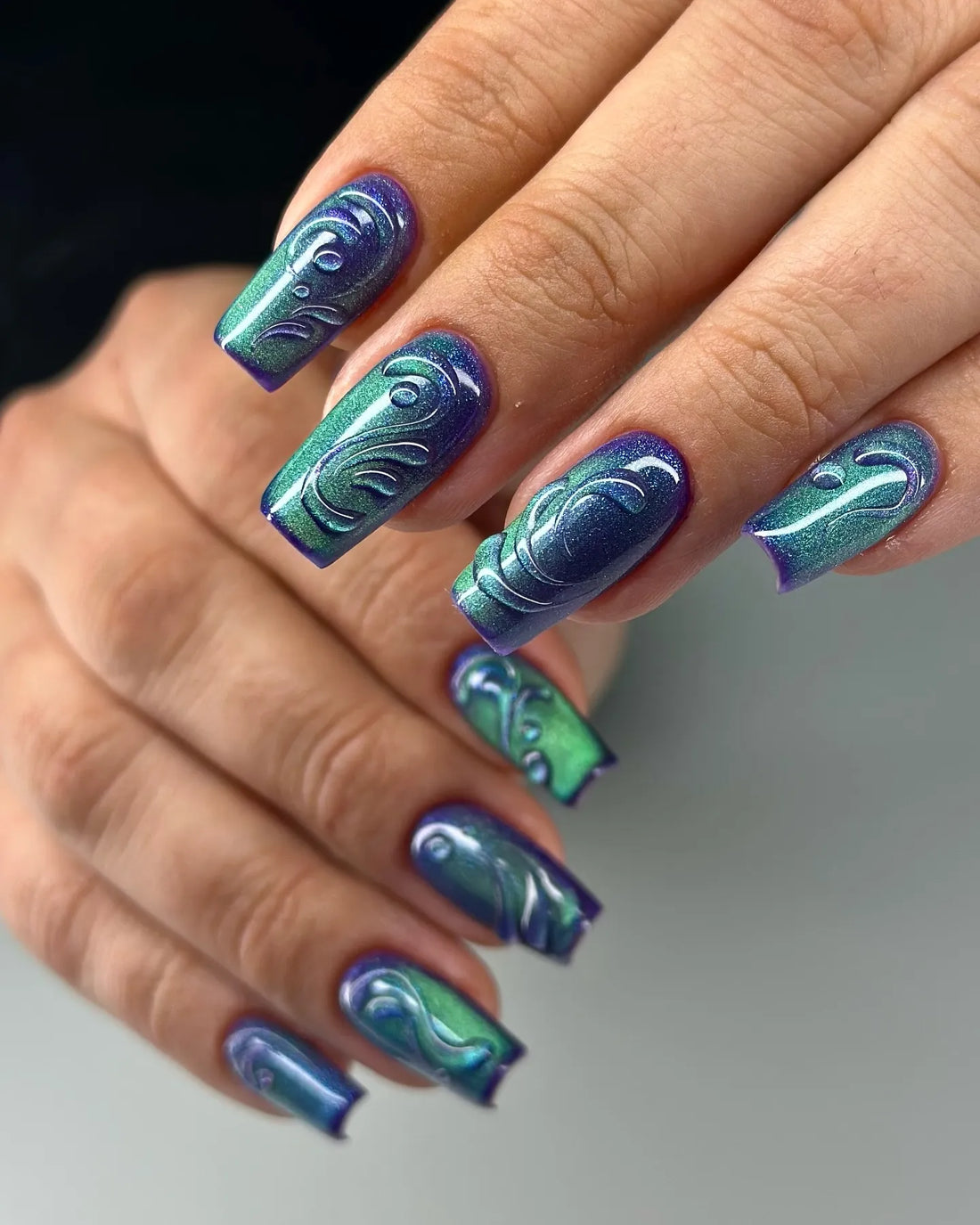 Handmade peacock green and purple 3D jelly swirl press-on nails with glossy finish