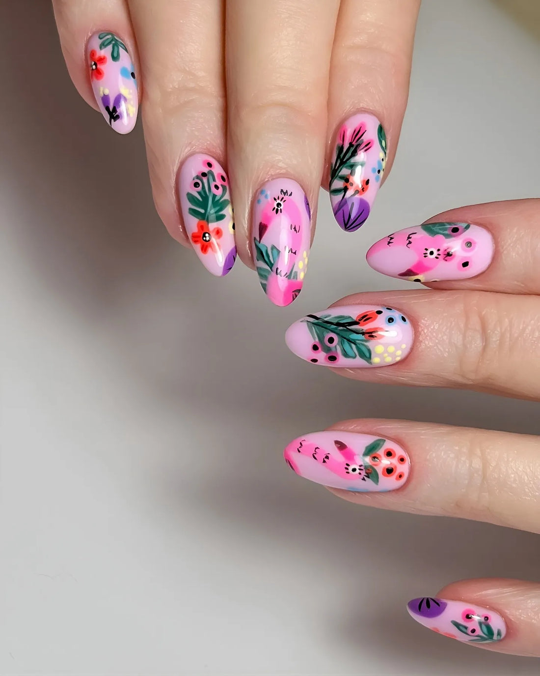 Handmade pink press-on nails with abstract garden floral and berries art design