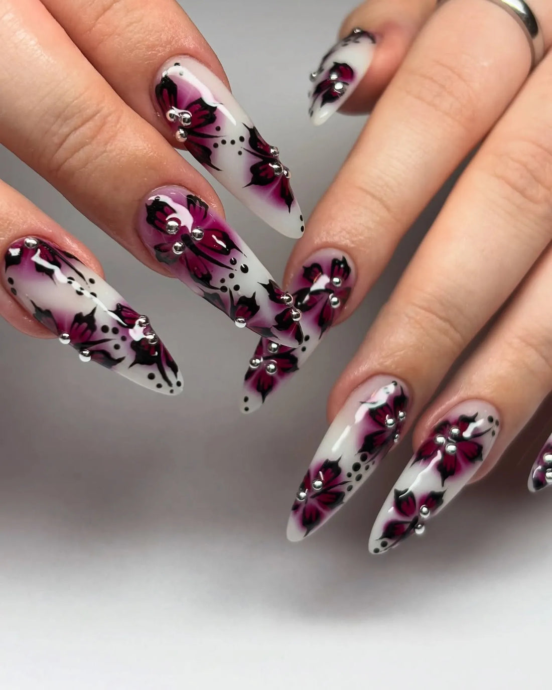 Handmade pink butterfly floral rhinestone press-on nails, elegant long almond shape