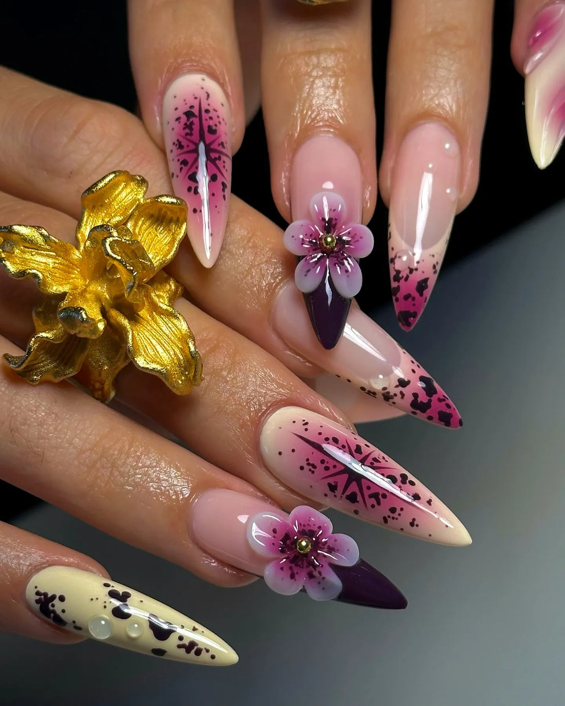 Handmade purple floral galaxy press-on nails with 3D flowers and star design