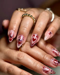 Handmade pink press-on nails with red chrome heart and floral folk art designs, Valentine theme