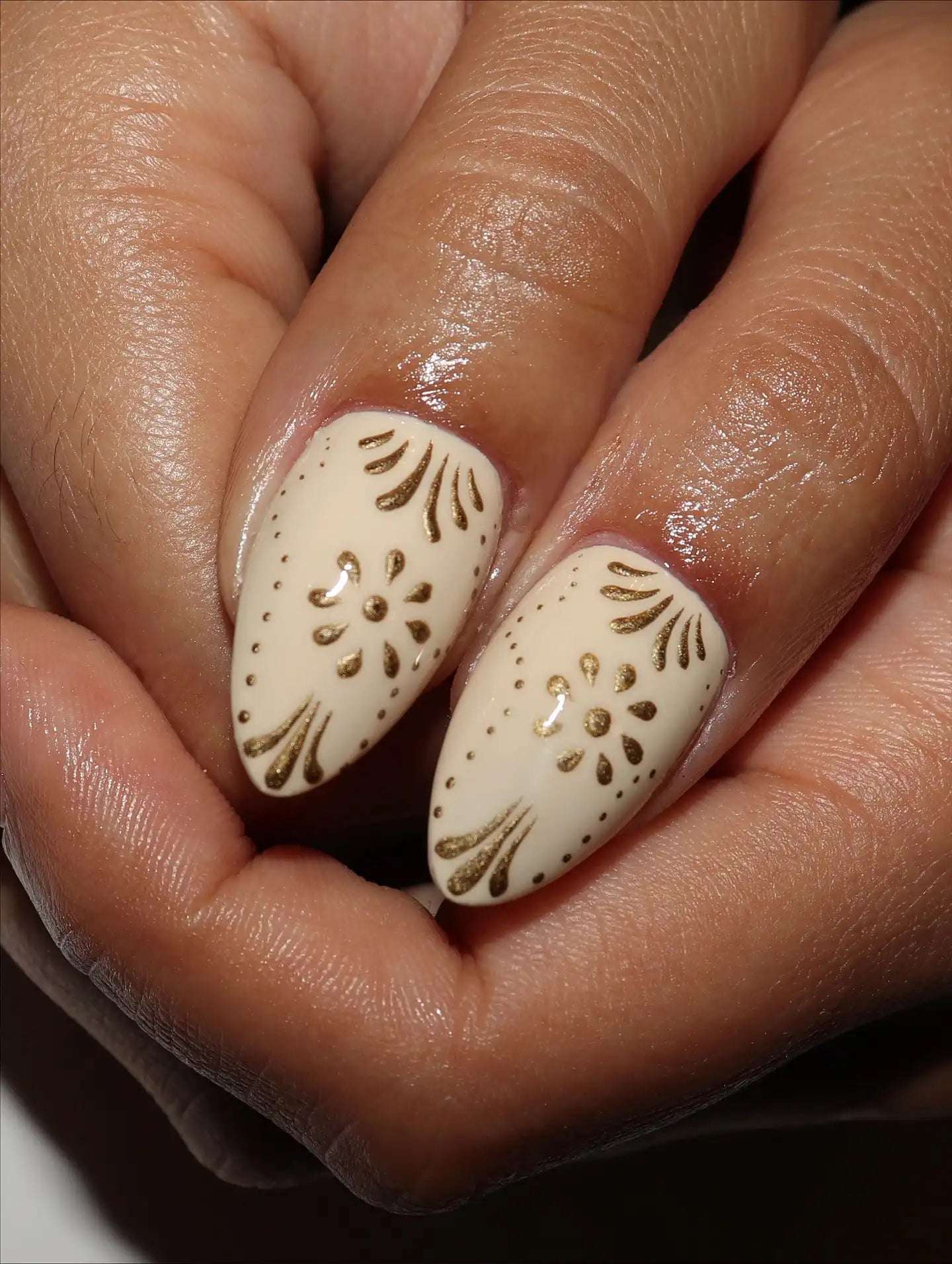 Handmade nude press-on nails with gold ornate floral folk art design