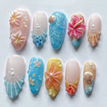 Handmade tropical beach press-on nails with 3D flower, shell, and pearl designs