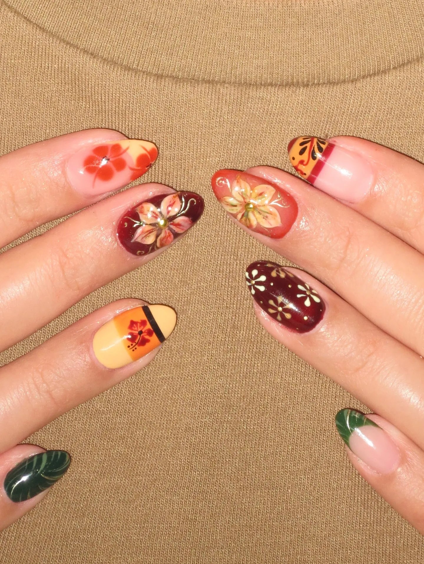 Handmade multi-color press-on nails with tropical hibiscus and autumn floral designs